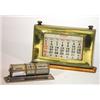 Image 1 : Brass framed and oak desk calendar and an aluminium desk calendar…