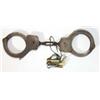 Image 1 : Pair of steel handcuffs…
