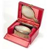 Image 1 : Cased three piece child's silver vanity set comprising mirror, brush and comb, Birmingham, 1928…