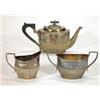 Image 1 : Three piece silver plate teaset comprising teapot with ebony handle and knop, sugar bowl and milk…