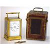 Image 1 : Leather cased brass French alarm carriage clock with visible movement and bevelled glass panels, …