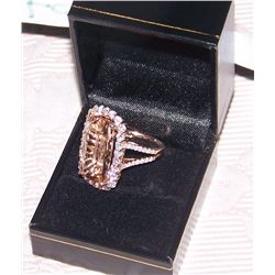 (1) PINK SAPPHIRE & 14K ROSE GOLD RING  13.6 CT + 2 CT DIAMONDS WEIGHING 9.9 GRAMS.