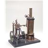 Image 1 : A brass and iron stationary engine, features include single cylinder, 8.25ins. grooved, flywheel,...