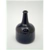 Image 1 : A George II mallet shape green glass bottle with seal inscribed Wm. Rendal 1739, 7.75ins. £1,200-...