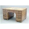 Image 1 : An Arts and Crafts oak pedestal desk, the acanthus carved red top inset with a brown skiver and s...