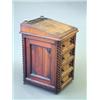 Image 1 : A George IV rosewood davenport, with batswing carved leather lined slope, swivelling top and 4 dr...