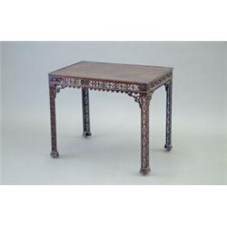 A George III mahogany silver table, with rectangular top, heart motif fretwork frieze, with corre...