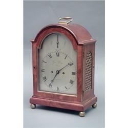 An early 19th century mantel clock by Geo. Younge, Strand, London, with arched, silvered dial, st...