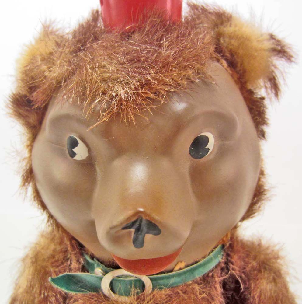 VINTAGE JOINTED TEDDY BEAR WITH PLASTIC FACE vintage-jointed-teddy-bear-with-plastic-face