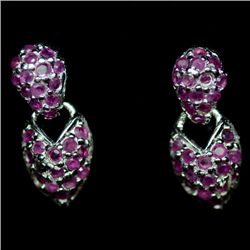 PAIR OF WHITE GOLD OVER STERLING SILVER RUBY EARRINGS