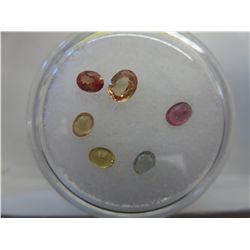 Gem jar filled with multi-coloured sapphires