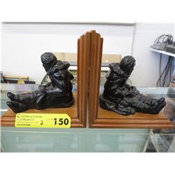 2 Bookends with Inuit figures - wood and resin