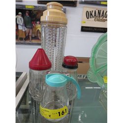 Four 1950's serve-ware/cocktail shaker