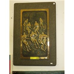 Brass relief panel of hockey players