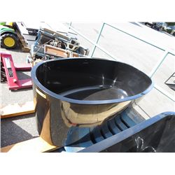Black stone soaker tub