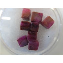 8 Genuine cut ruby gemstones in gem jar