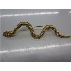 4" Long gold tone snake brooch