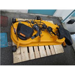 Shroud assembly for a ride on lawnmower