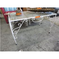 Vintage cast iron patio table with glass top