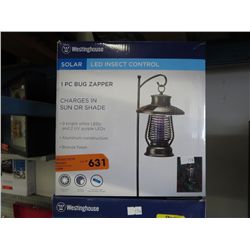 Solar bug zapper, in box.