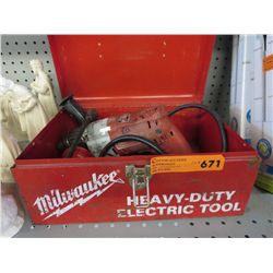 Milwaukee Heavy Duty drill in metal box