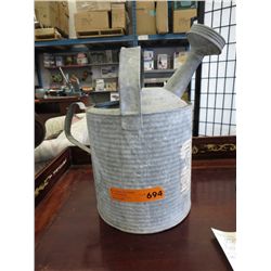 Vintage tin watering can