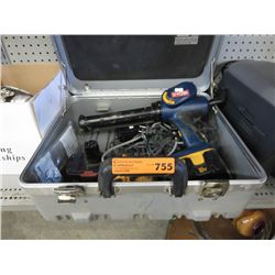 Metal case containing cordless tools