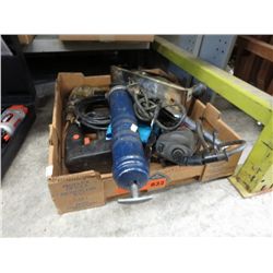 Box containing power and hand tools