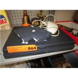 Gateway 2000 floppy disk drive and notebook