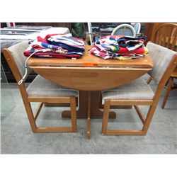 Table & 2 chairs. Table has drop leaf sides.