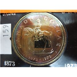 1973 RCMP Centennial silver dollar with toning
