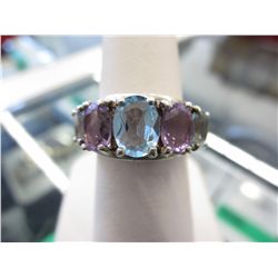 Silver ring set with 5 oval amethysts & blue topaz