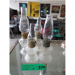 4 Depression glass mini oil lamps