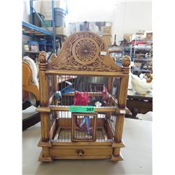 Ornamental bird cage with ornamental birds