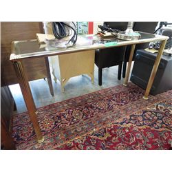 Glass top brass console table.