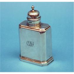 An Edwardian silver tea caddy of George I design, 5.25ins. £200-300...