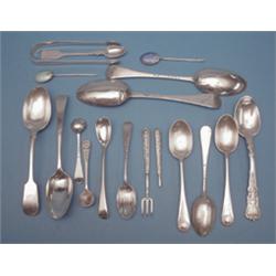 A group of silver flatware, including 2 tablespoons and a pair of tongs £70-100...