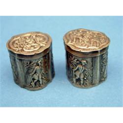 Two Dutch silver pill boxes, embossed with 18th century figures 1.25ins £100-150...
