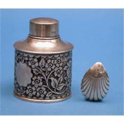 An Edwardian silver tea caddy, of cylinder form with floral decoration, 4ins; and an Edwardian ca...
