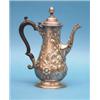 Image 1 : A George III silver coffee pot, of baluster form with ebonised handle and rococco scroll decorati...