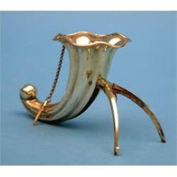 An unusual Victorian gilt posy holder, with folding supports 4ins £300-400...