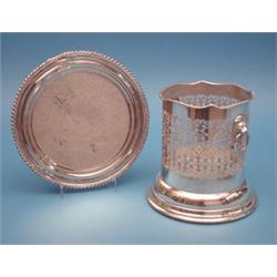 An Old Sheffield plate salver, 8ins, and a plated syphon stand £40-60...