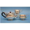 Image 1 : A George V 3-piece silver tea set, of compressed circular form with tongue and dart border, 1911...