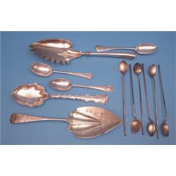 Two ornate Sterling serving spoons, a set of 6 white metal spoons and 4 silver spoons £100-150...