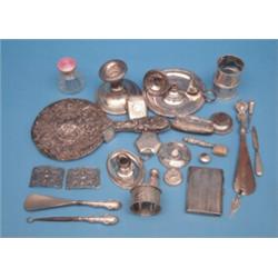 A group of associated small silver, including 3 napkin rings, a pin cushion and scent bottles £15...