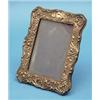 Image 1 : An Edwardian silver mounted photo frame, with foliate scroll decoration 7.5ins £100-150...