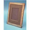 Image 1 : A George V silver mounted photo frame, with ribbon tied reeded border 10ins £150-200...