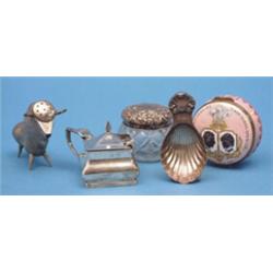 A silver scallop bowl caddy spoon, a mustard, a toilet jar and 2 other items £70-100...