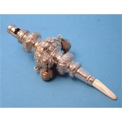 A Victorian silver rattle, with whistle, 4 bells and ivory teether, Birmingham 1894 £250-300...