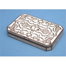 A Continental white enamelled silver box, with foliate scroll decoration 3.5ins £120-150...